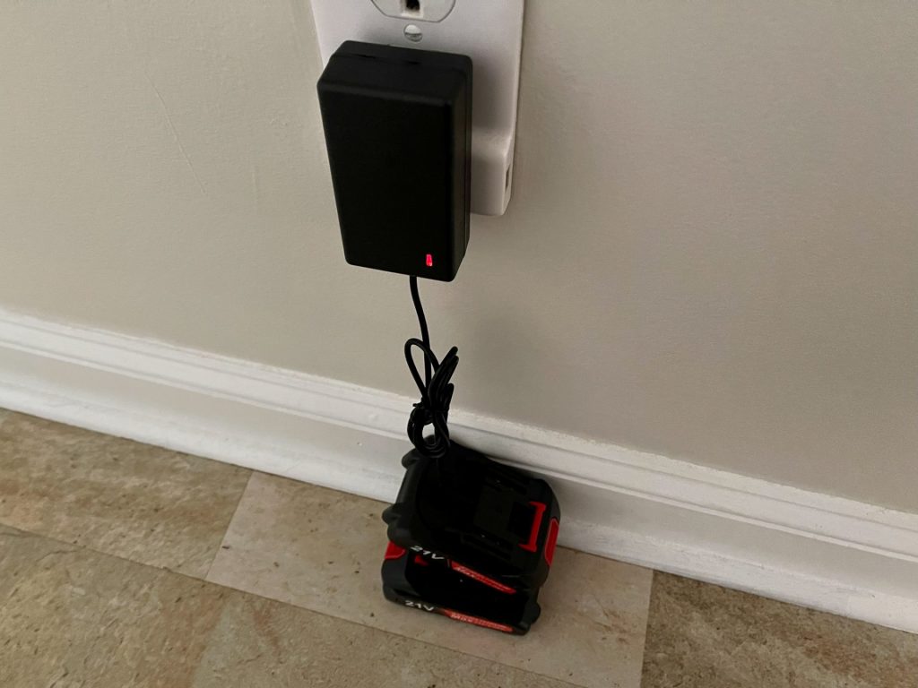 Charging one of the batteries.