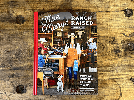 Five Mary's Ranch Raised Cookbook on a table