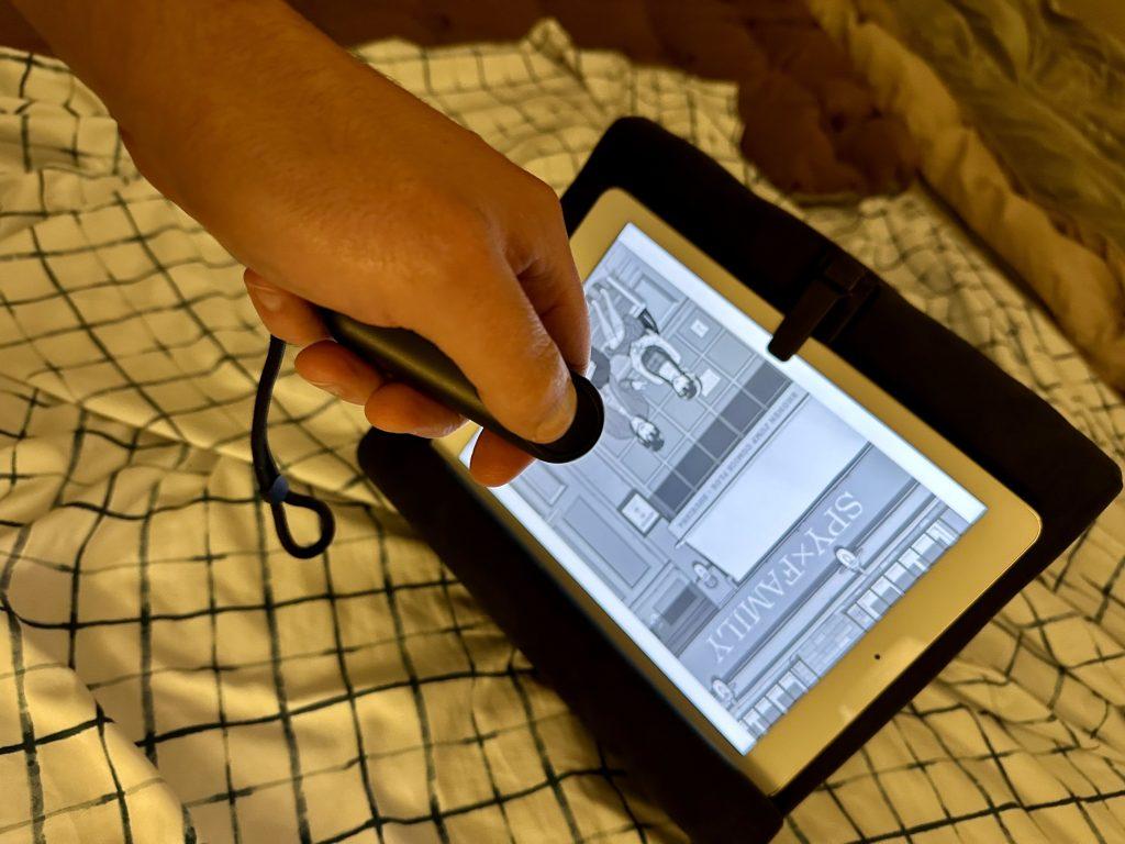 UNIBITRI Remote Page Turner on a bed